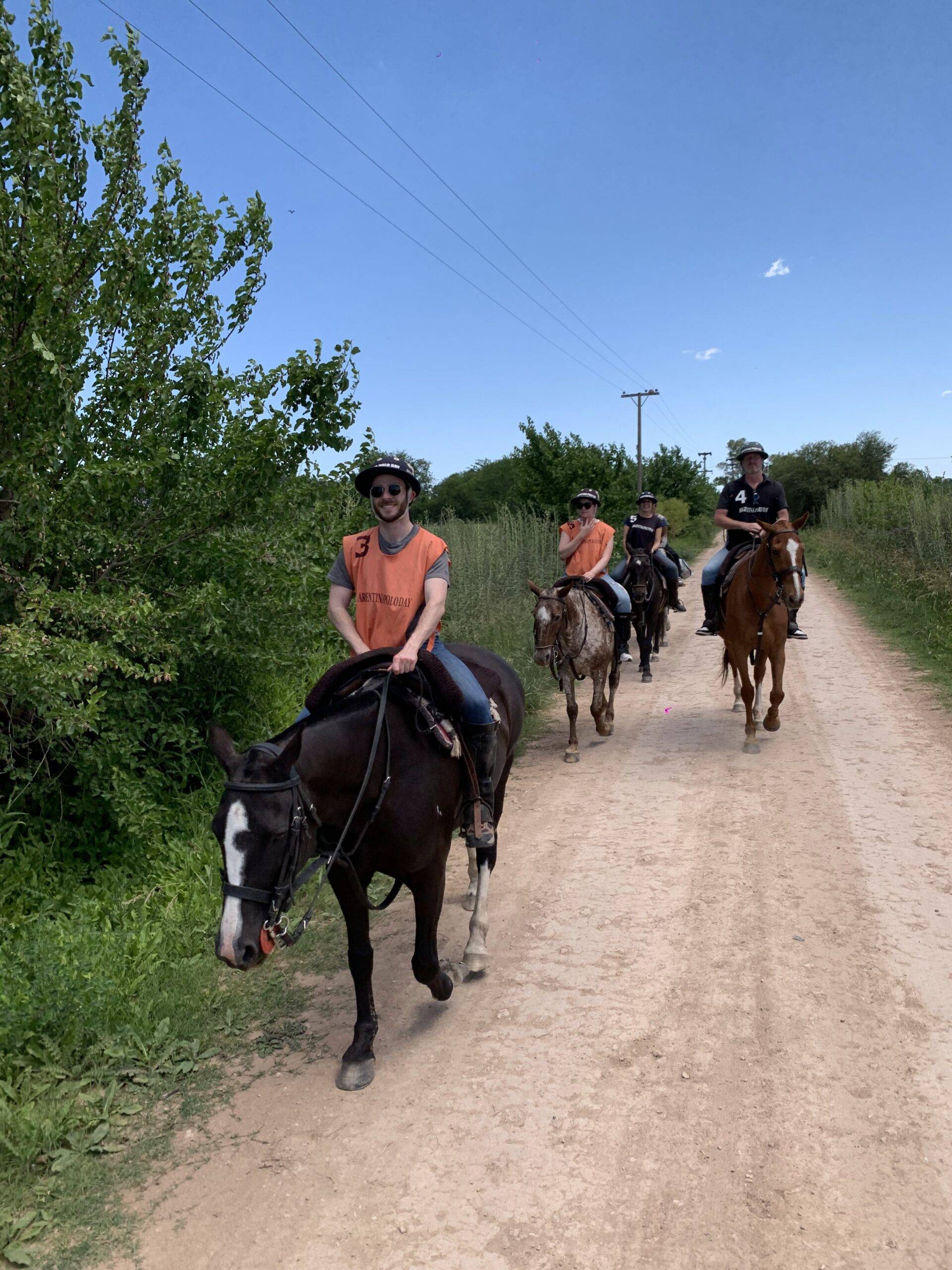 people riding horses in estancia